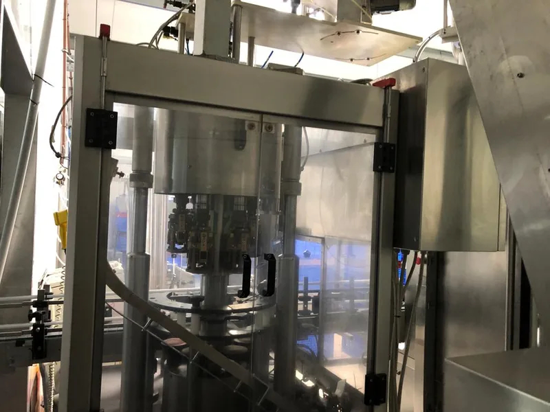 Photo #3 of Used Arol Capping Machine 6 heads aluminum screw 9000 bph