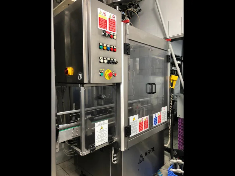 Photo #5 of Used Arol Capping Machine 6 heads aluminum screw 9000 bph