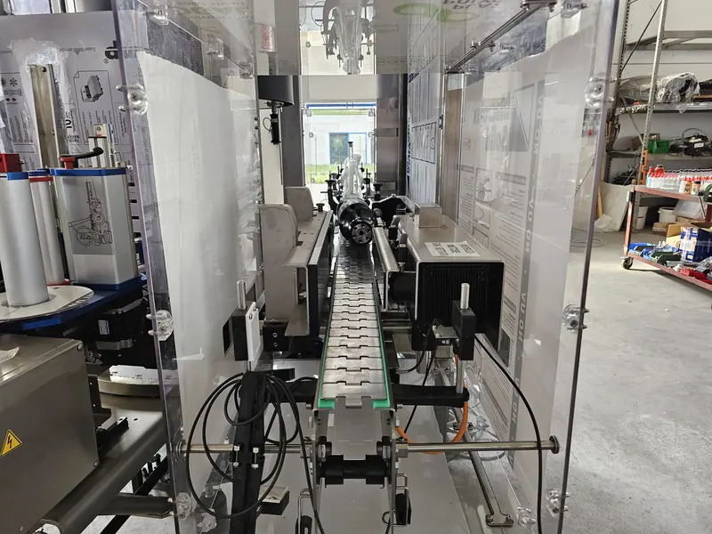 Photo #8 of automatic rotary adhesive labeler with modular optical centering